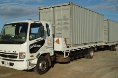2x 20' shipping container transport
